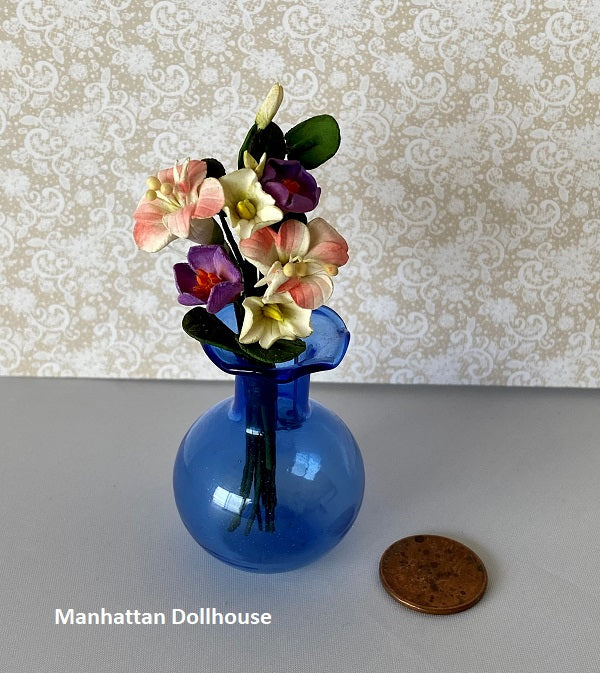 Miniature Lilies in Blue Vase