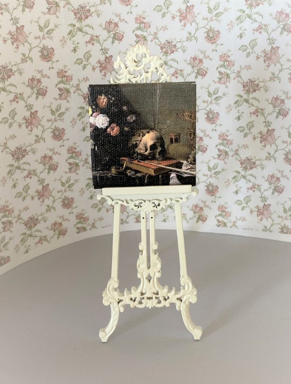 White Easel with Skull Painting