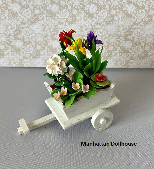 Miniature Flower Arrangement in a White Wheelbarrow