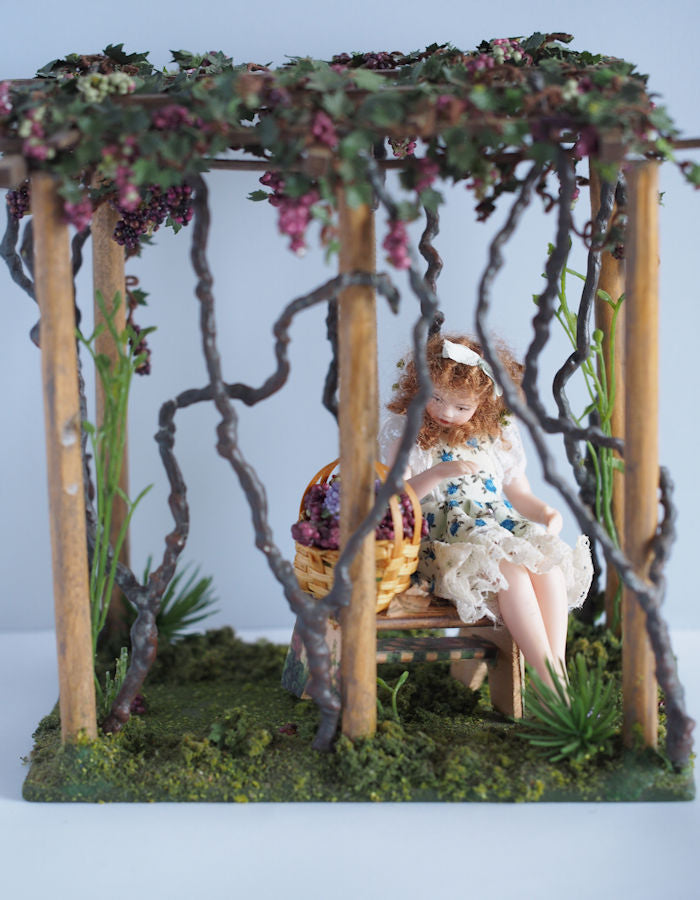 Miniature Trellis with Grapes, Doll, Bench and Flowers