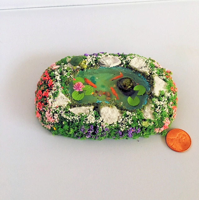 Miniature Pond with Fish and a Turtle