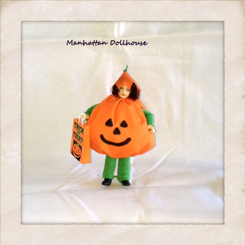 Dollhouse Doll dressed in a Pumpkin Halloween Outfit