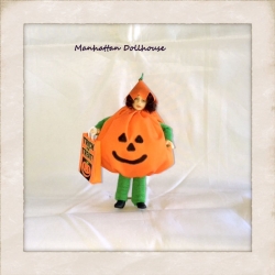 Dollhouse Doll dressed in a Pumpkin Halloween Outfit