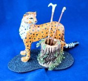 Leopard with the umbrella/cane stand, canes included.